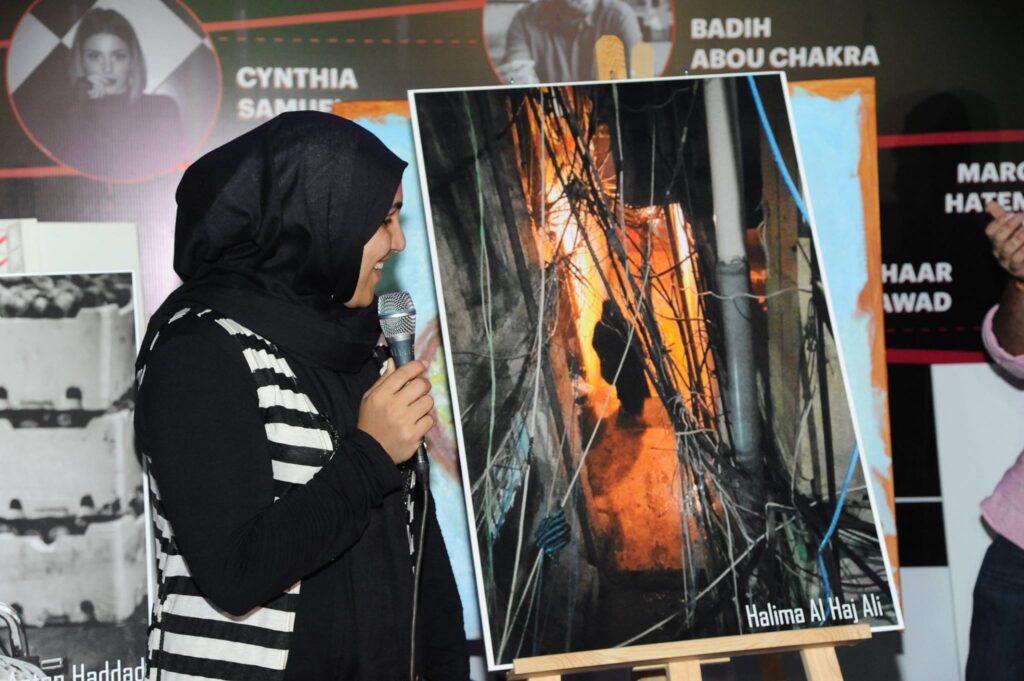 Halima Al Haj Ali presenting her photograph at the photography competition