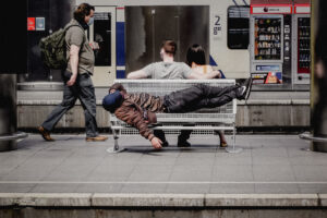 berlin couple sitting on the bench homeless sleeping on the bench femlens