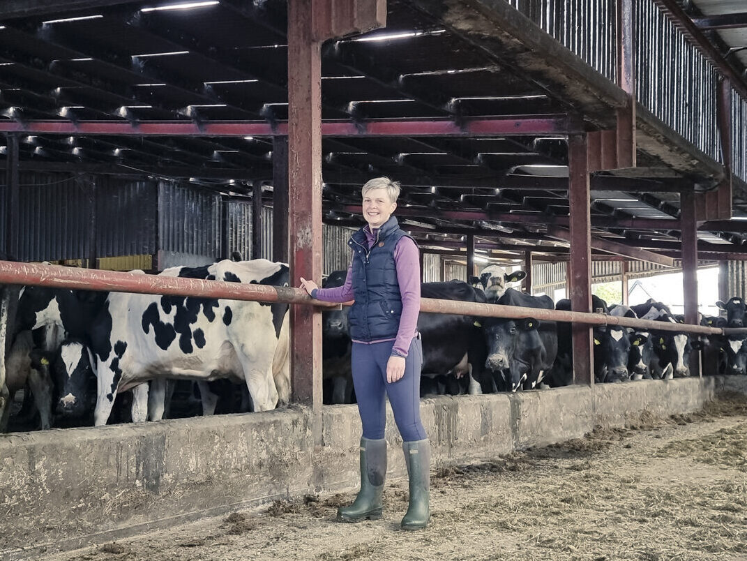 Gillian in the cow shed at Ballybogan Farm, Lifford.